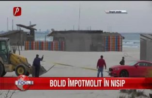 Bolid împotmolit în nisip