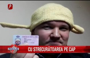 Cu strecuratoarea pe cap