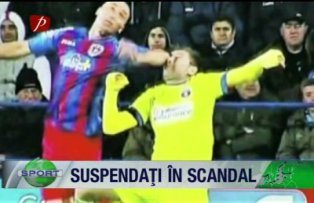 Suspendaţi în scandal