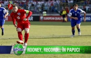 Rooney, record... în papuci