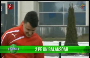 2 pe un balansoar