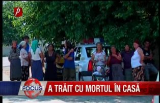 A trait cu mortul in casa