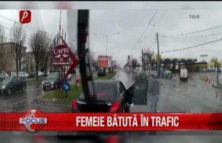 Femeie batuta in trafic