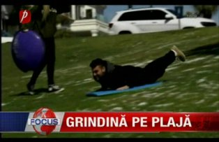 Grindina pe plaja