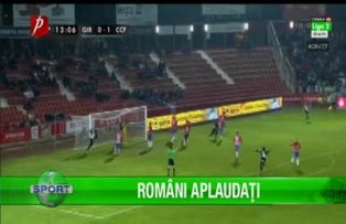 Români aplaudaţi