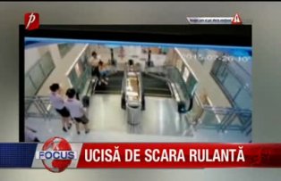 Ucisă de scara rulantă