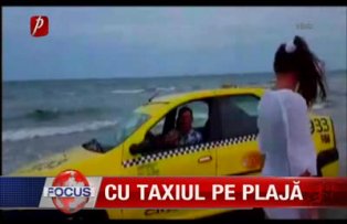 Cu taxiul pe plaja