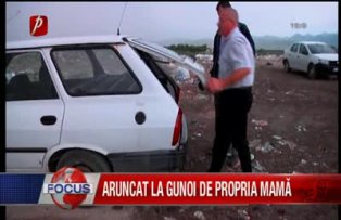 Aruncat la gunoi de propria mama