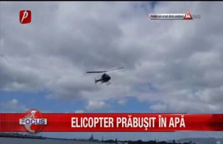 Elicopter prabusit in apa